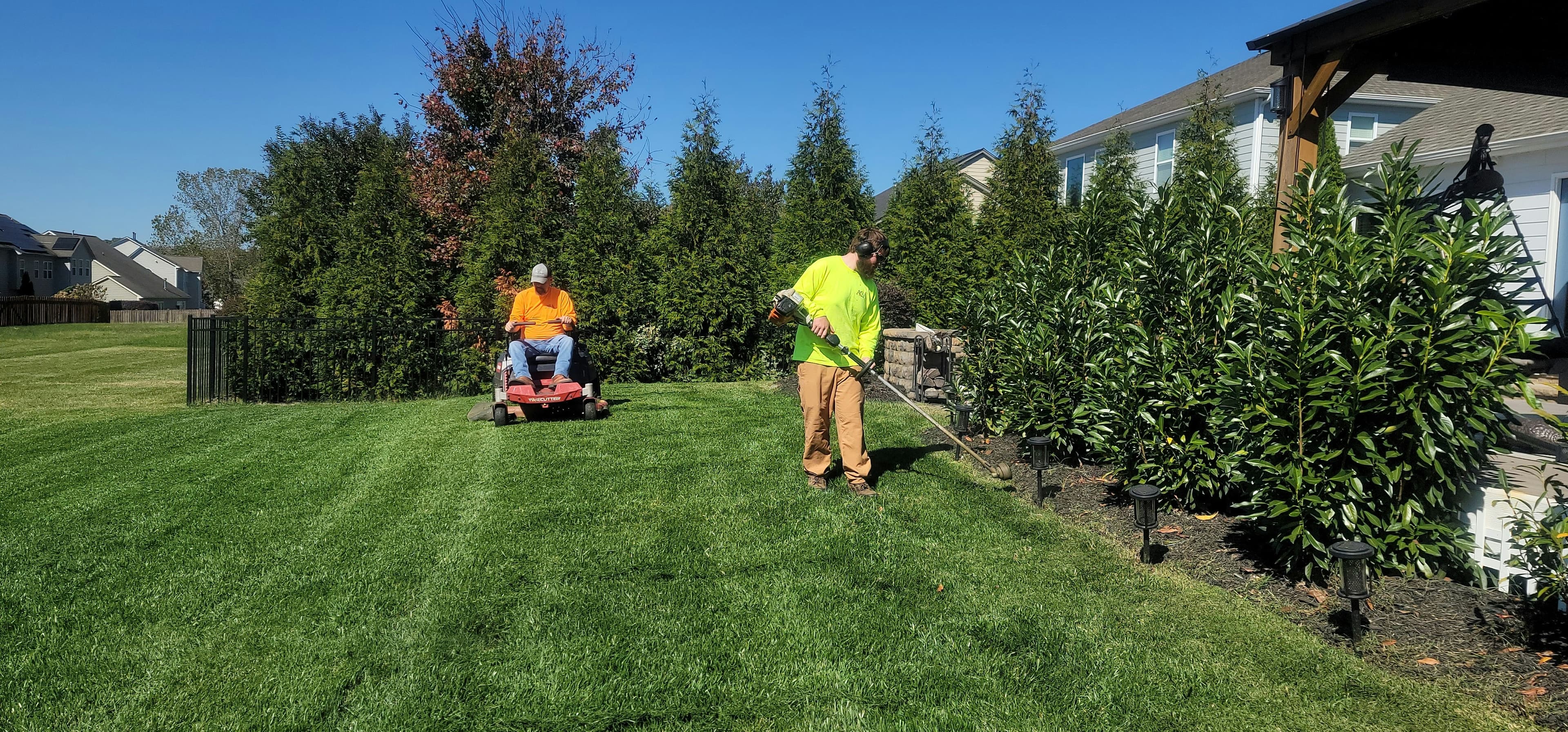 Georgetown Lawn Pros team servicing residential property in Georgetown TX — Georgetown Lawn Pros