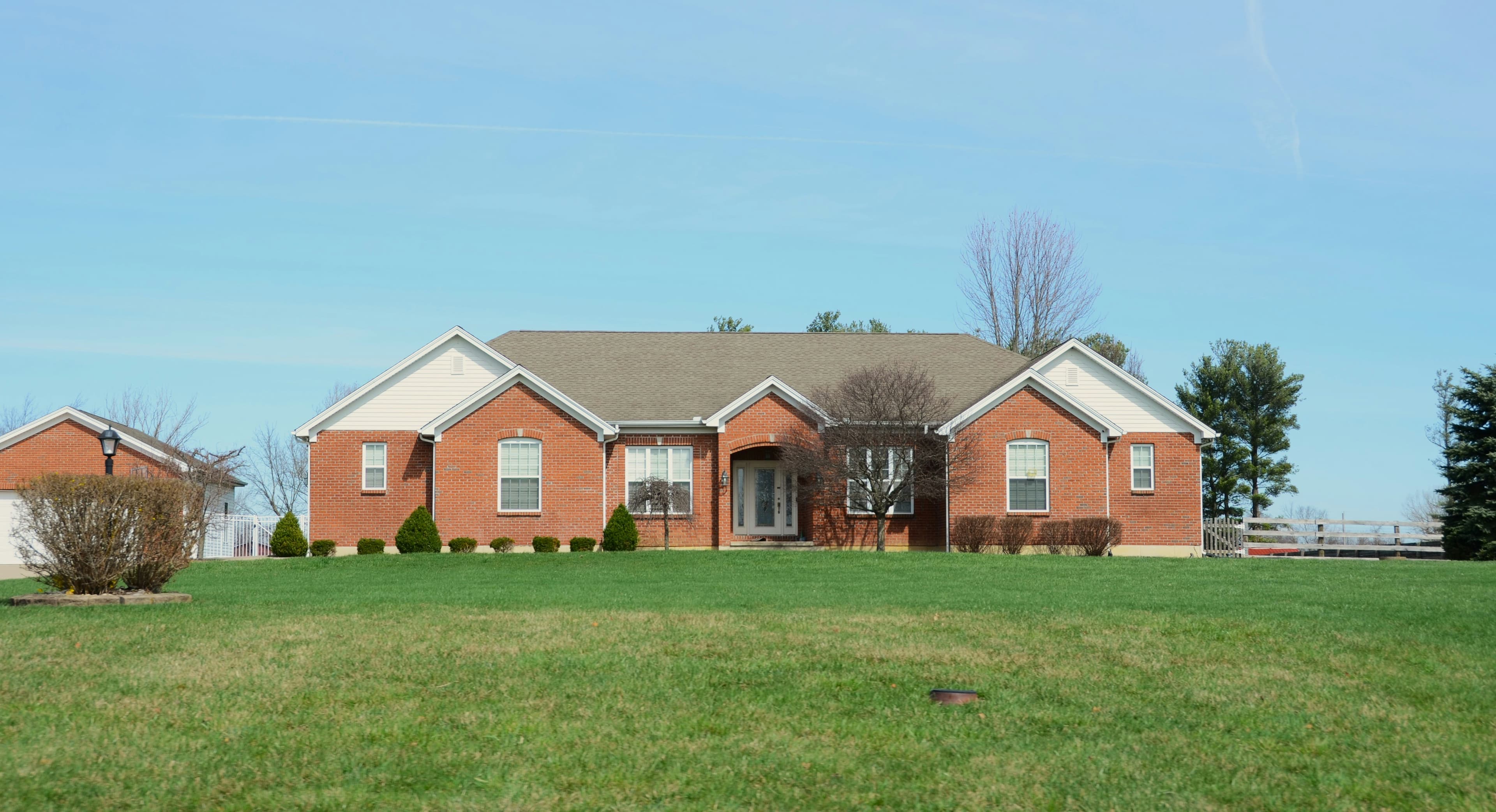Professional lawn care team servicing residential property in Georgetown TX — Georgetown Lawn Pros